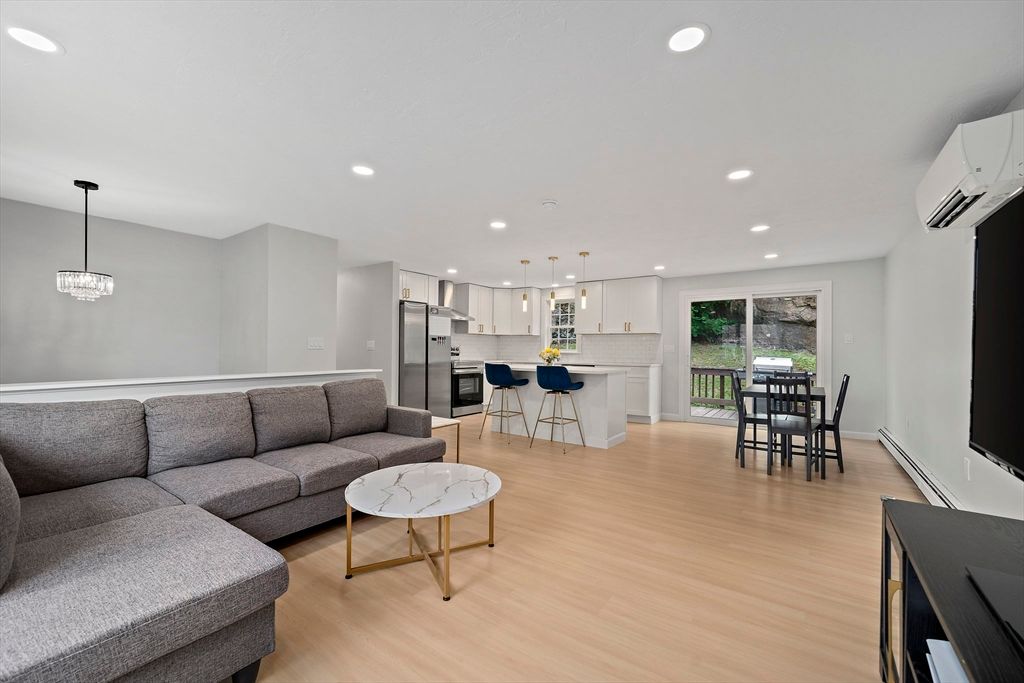 Dining room, Interior, Kitchen, Living room, Pendant Lights, Recessed Lighting, Stainless Steel Appliances, Wood Texture Flooring