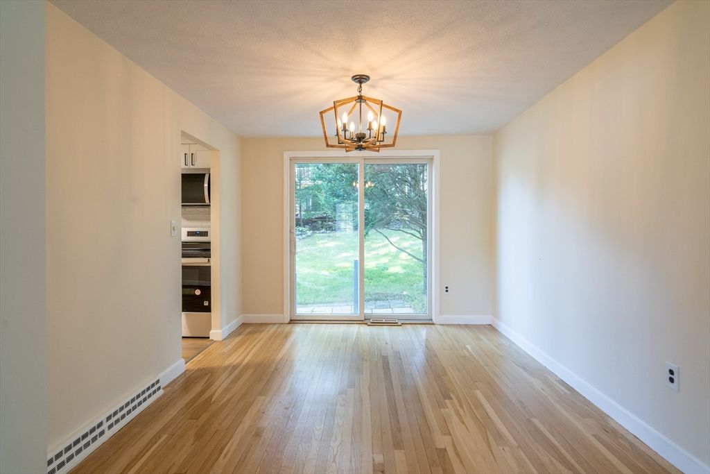Chandelier, Empty room, Interior, Stainless Steel Appliances, Wood Texture Flooring