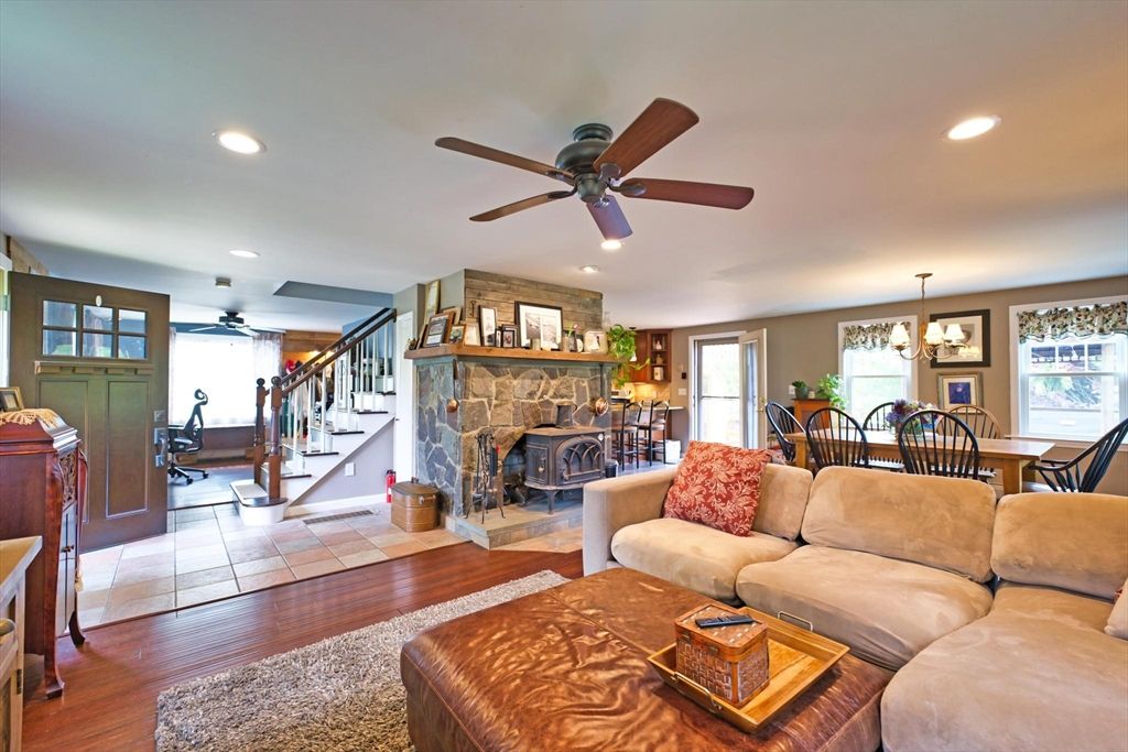 Chandelier, Dining room, Fireplace, Interior, Living room, Recessed Lighting, Wood Texture Flooring