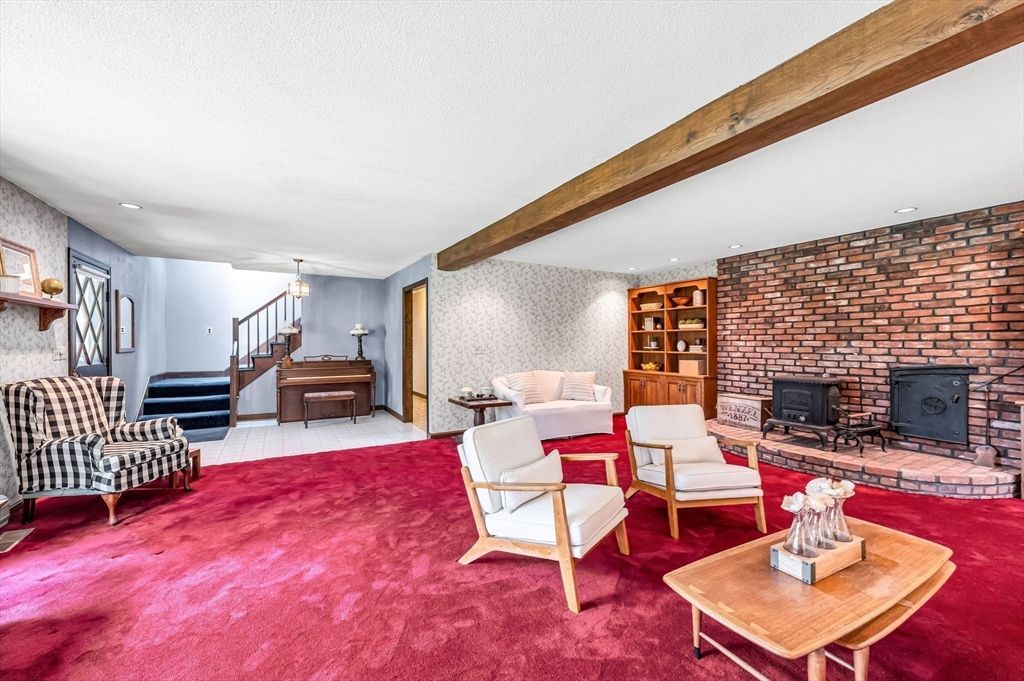 Fireplace, Interior, Living room, Pendant Lights, Piano, Recessed Lighting, Stone Walls, Wooden Beams