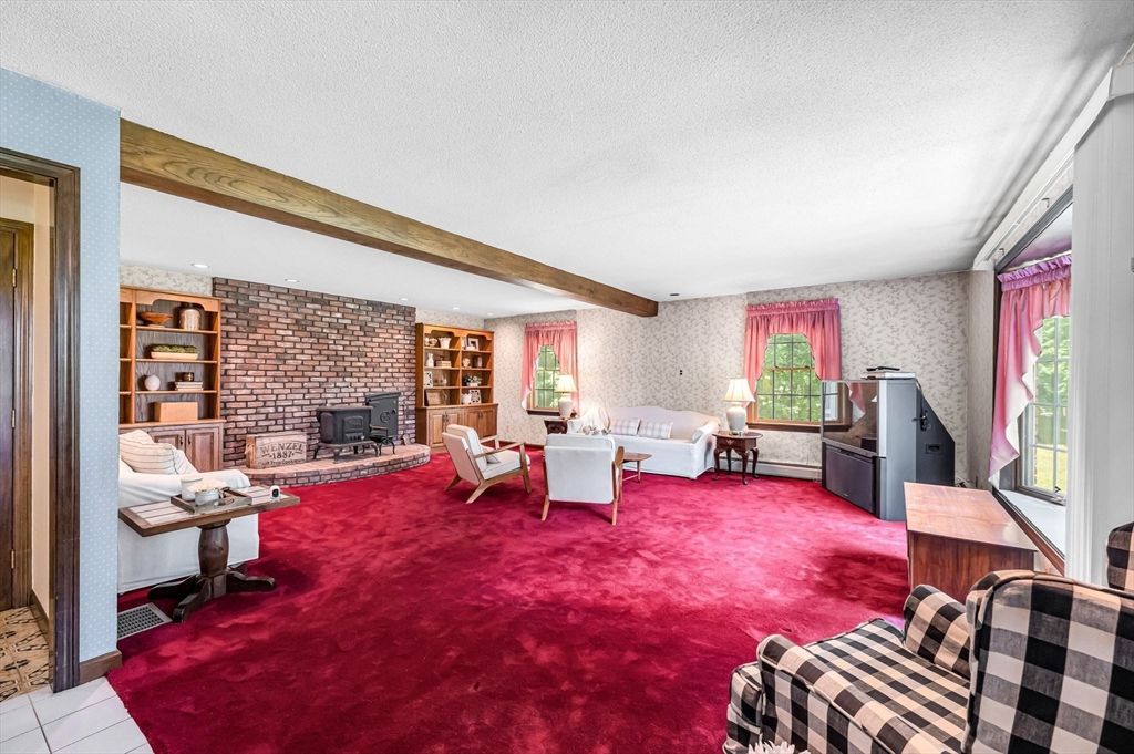 Dining room, Fireplace, Interior, Living room, Recessed Lighting, Stone Walls, Wooden Beams