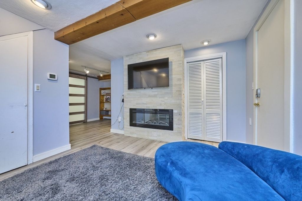 Fireplace, Interior, Recessed Lighting, Stone Walls, Wooden Beams, Wood Texture Flooring