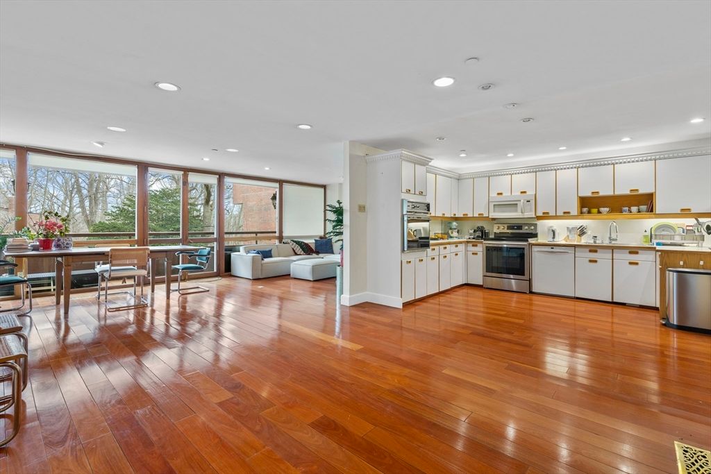 Dining room, Interior, Kitchen, Living room, Recessed Lighting, Stainless Steel Appliances, Wood Texture Flooring