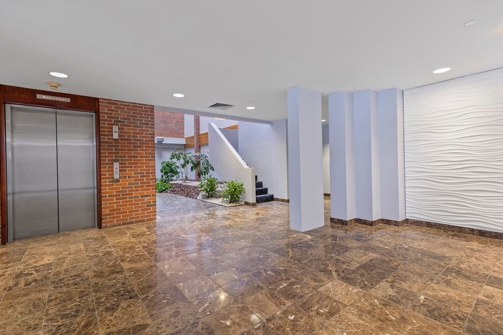 Elevator, Interior, Recessed Lighting, Stone Walls