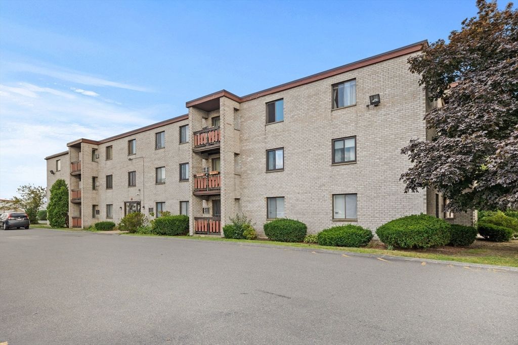 Exterior, Facade, Brick Facade, Condo Building