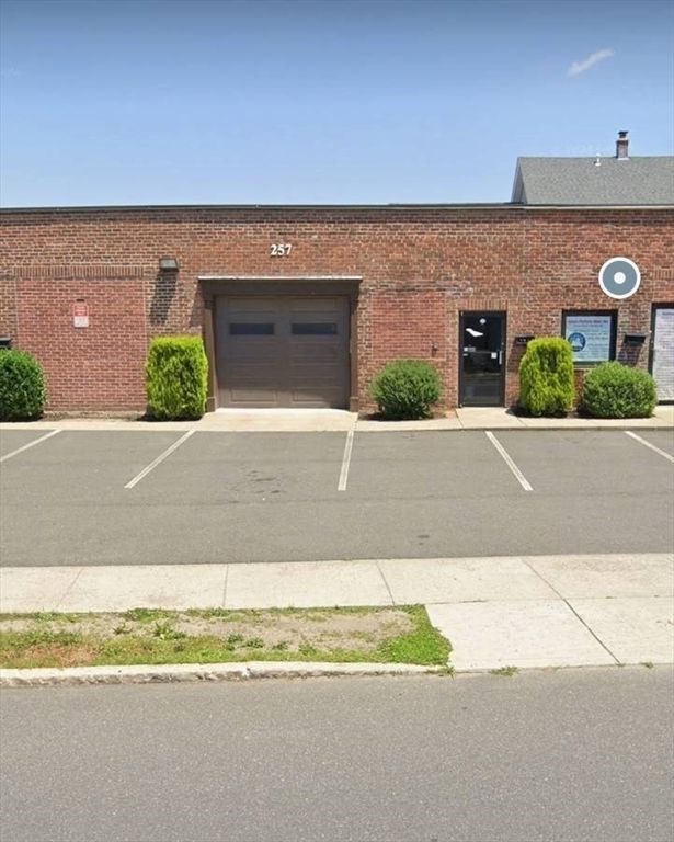 Attached, Exterior, Facade, Brick Facade, Condo Building