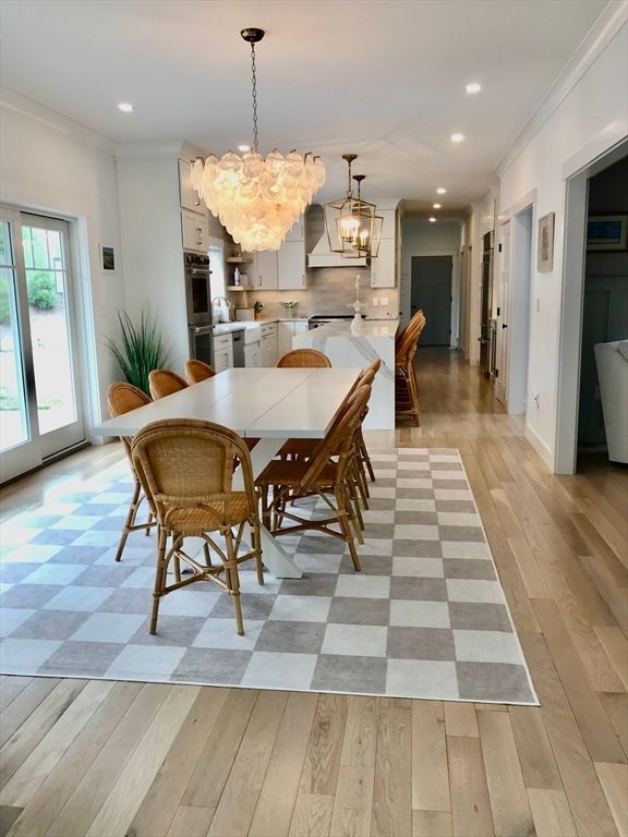 Chandelier, Dining room, Interior, Kitchen, Recessed Lighting, Stainless Steel Appliances, Wood Texture Flooring