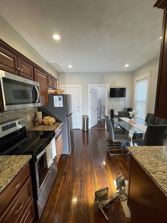 Dining room, Interior, Kitchen, Recessed Lighting, Stainless Steel Appliances, Wood Texture Flooring