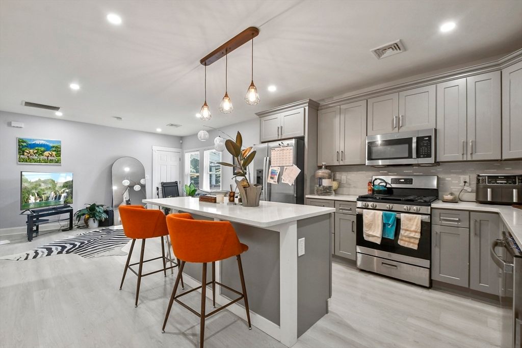 Interior, Kitchen, Pendant Lights, Recessed Lighting, Stainless Steel Appliances, Wood Texture Flooring