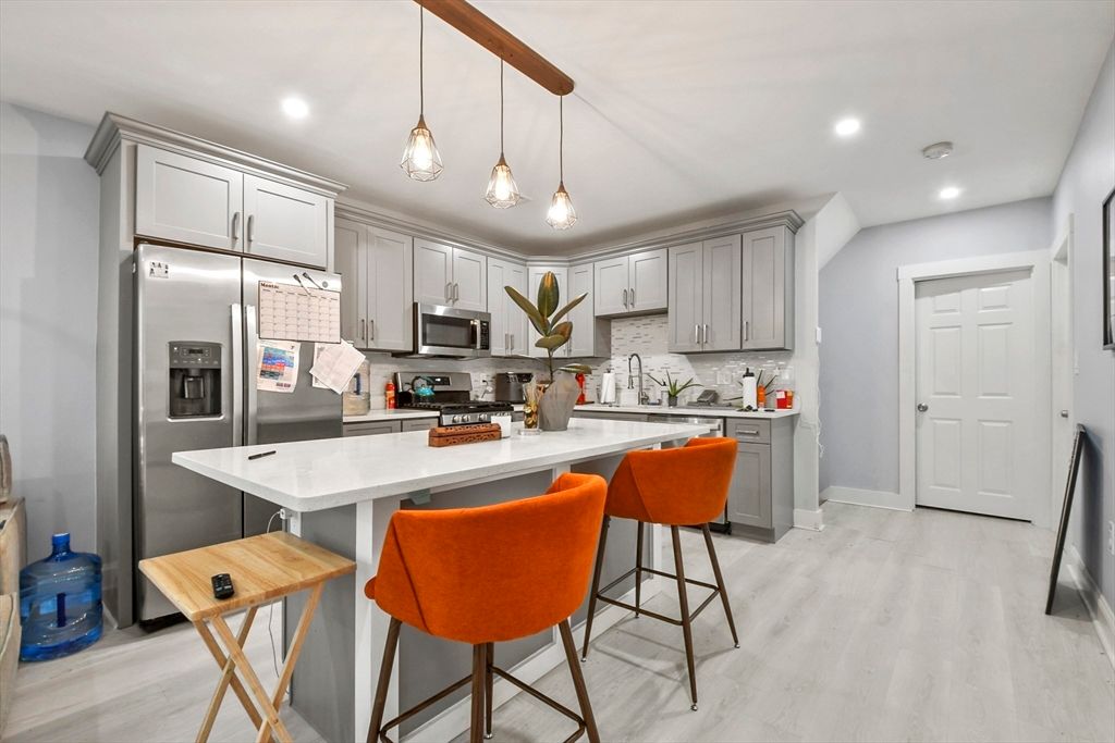 Interior, Kitchen, Pendant Lights, Recessed Lighting, Stainless Steel Appliances, Wood Texture Flooring