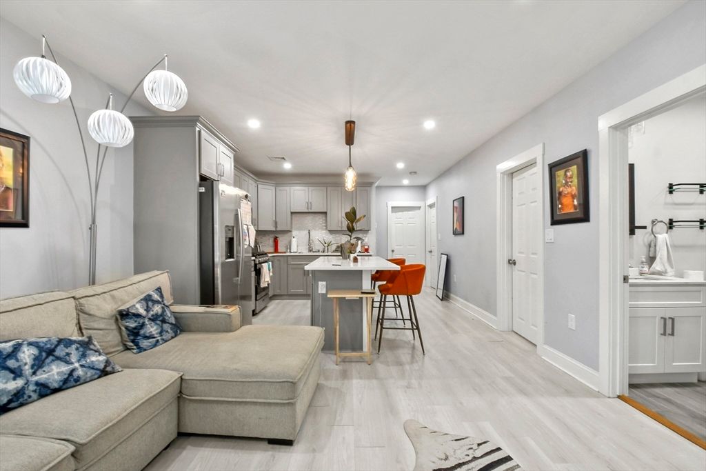 Dining room, Interior, Kitchen, Living room, Pendant Lights, Recessed Lighting, Stainless Steel Appliances, Wood Texture Flooring