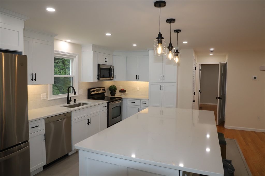 Interior, Kitchen, Pendant Lights, Recessed Lighting, Stainless Steel Appliances, Wood Texture Flooring