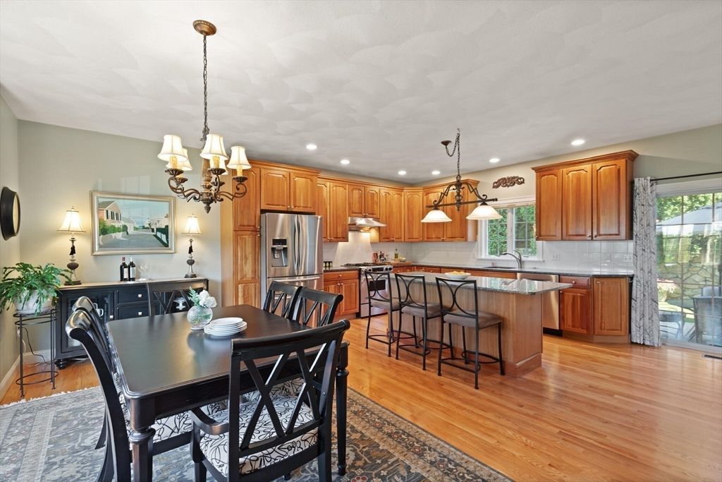 Chandelier, Dining room, Interior, Kitchen, Pendant Lights, Recessed Lighting, Stainless Steel Appliances, Wood Texture Flooring