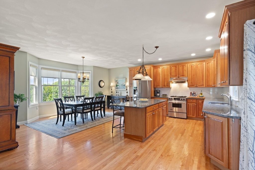 Dining room, Interior, Kitchen, Pendant Lights, Recessed Lighting, Stainless Steel Appliances, Wood Texture Flooring