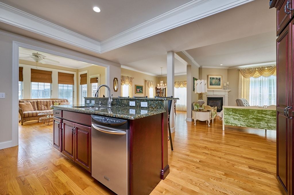 Chandelier, Fireplace, Interior, Kitchen, Living room, Recessed Lighting, Wood Texture Flooring