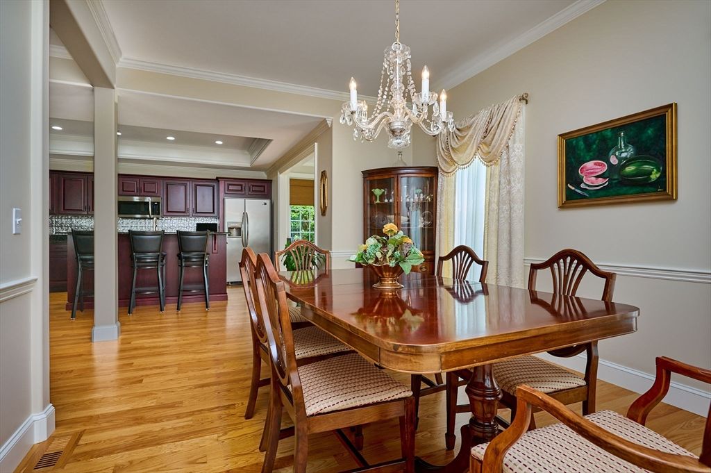 Chandelier, Dining room, Interior, Kitchen, Recessed Lighting, Stainless Steel Appliances, Wood Texture Flooring