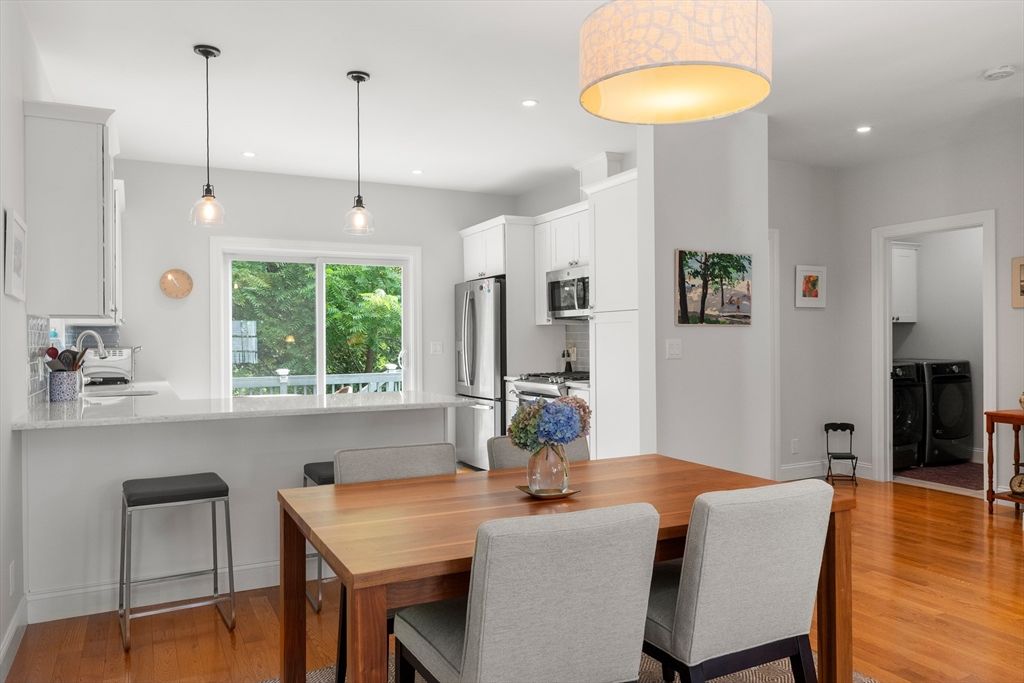 Dining room, Interior, Kitchen, Pendant Lights, Recessed Lighting, Stainless Steel Appliances, Wood Texture Flooring