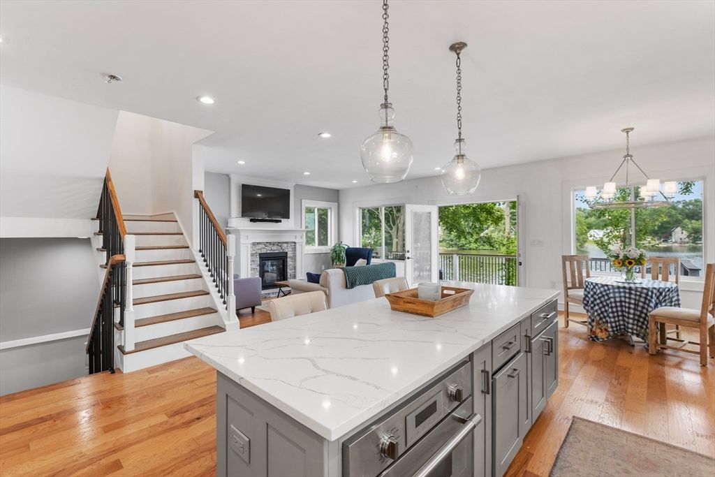 Dining room, Fireplace, Interior, Kitchen, Pendant Lights, Recessed Lighting, Wood Texture Flooring