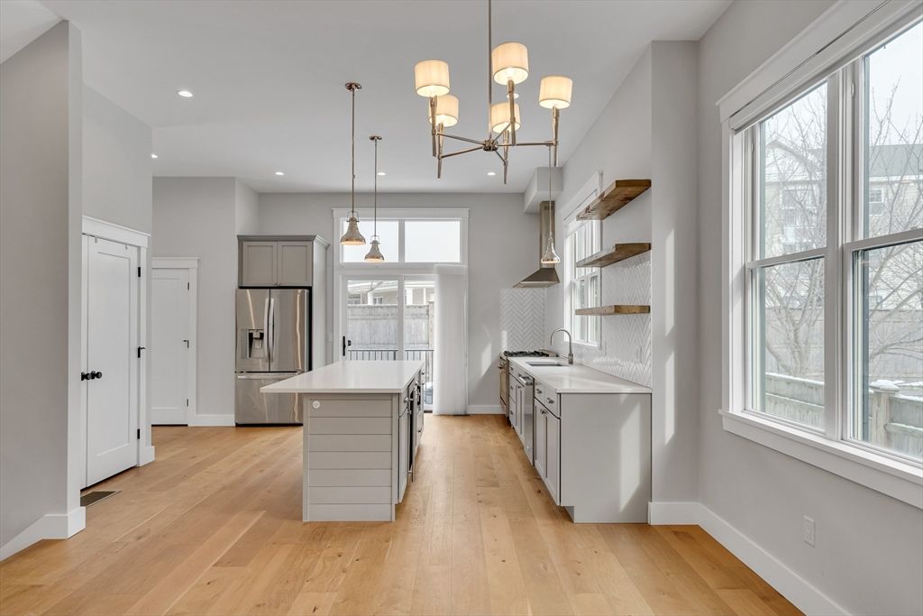 Chandelier, Interior, Kitchen, Pendant Lights, Recessed Lighting, Stainless Steel Appliances, Wood Texture Flooring