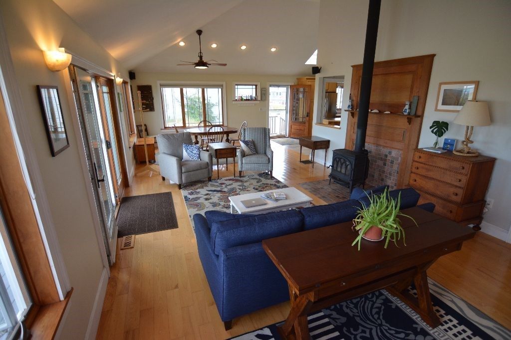 Dining room, Fireplace, Interior, Living room, Recessed Lighting, Wood Texture Flooring