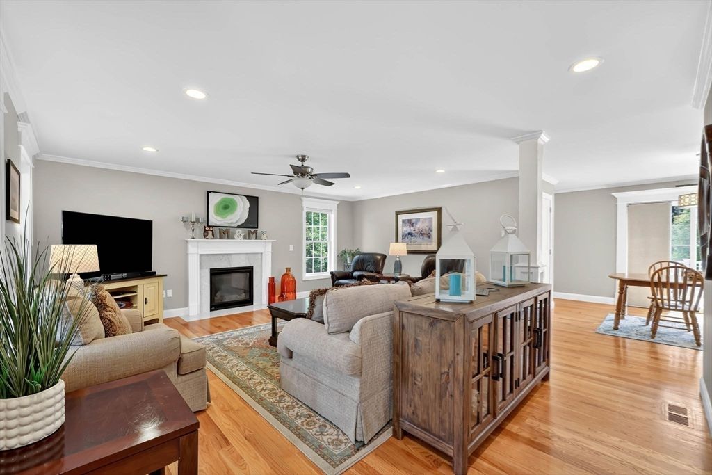Dining room, Fireplace, Interior, Living room, Recessed Lighting, Wood Texture Flooring