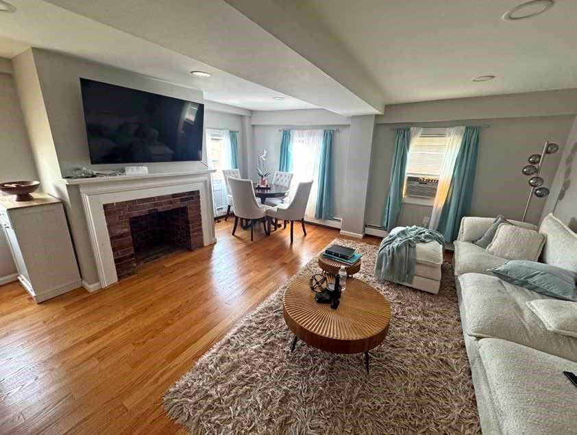 Dining room, Fireplace, Interior, Living room, Recessed Lighting, Wood Texture Flooring