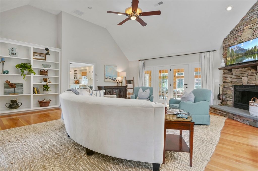 Fireplace, Interior, Living room, Recessed Lighting, Stone Walls, Wood Texture Flooring