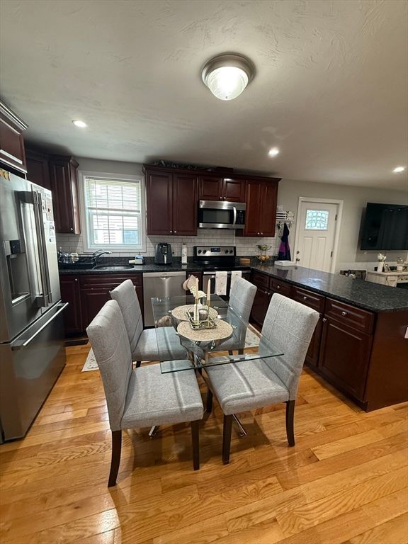 Dining room, Interior, Kitchen, Recessed Lighting, Stainless Steel Appliances, Wood Texture Flooring