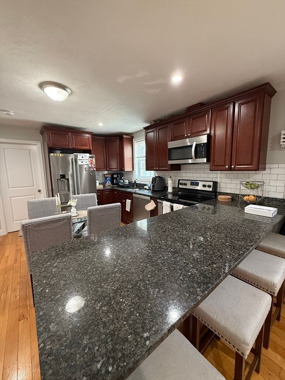 Dining room, Interior, Kitchen, Recessed Lighting, Stainless Steel Appliances, Wood Texture Flooring