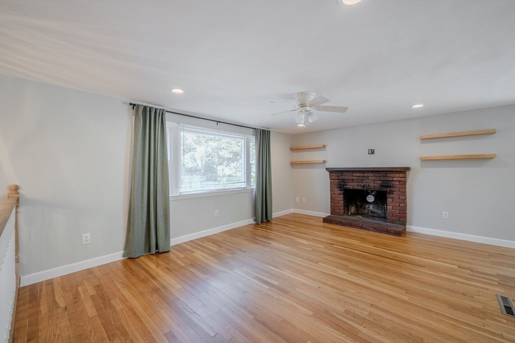 Empty room, Fireplace, Interior, Recessed Lighting, Wood Texture Flooring