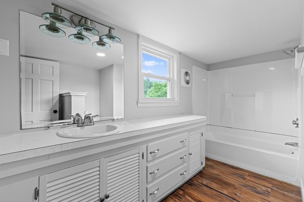 Bathroom, Dual Sink Vanities, Interior, Recessed Lighting, Wood Texture Flooring