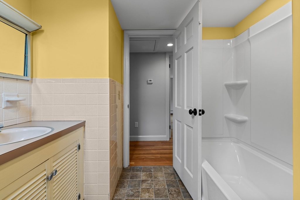 Bathroom, Dual Sink Vanities, Interior, Recessed Lighting, Wood Texture Flooring
