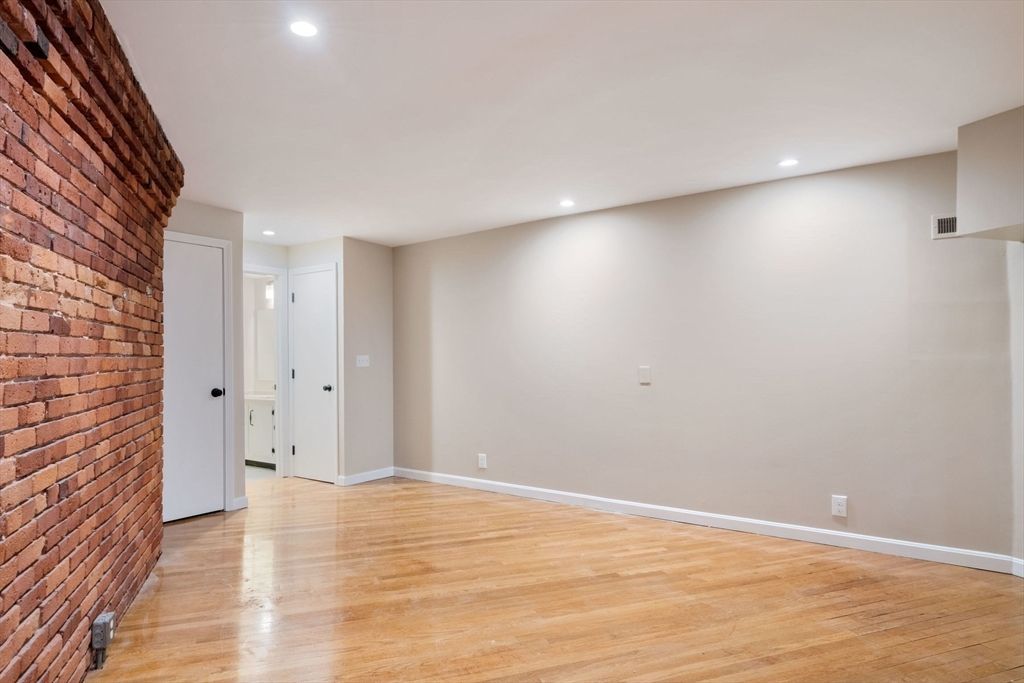 Empty room, Interior, Recessed Lighting, Stone Walls, Wood Texture Flooring