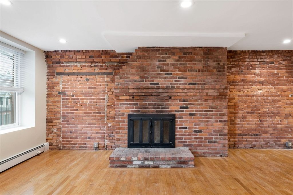 Fireplace, Interior, Recessed Lighting, Stone Walls, Wood Texture Flooring