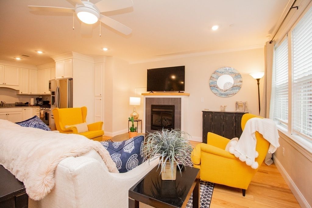 Fireplace, Interior, Kitchen, Living room, Recessed Lighting, Stainless Steel Appliances, Wood Texture Flooring