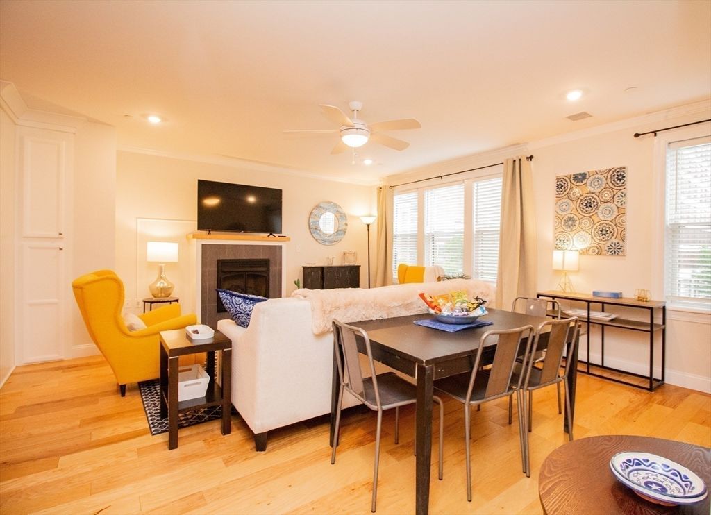 Dining room, Fireplace, Interior, Living room, Recessed Lighting, Wood Texture Flooring