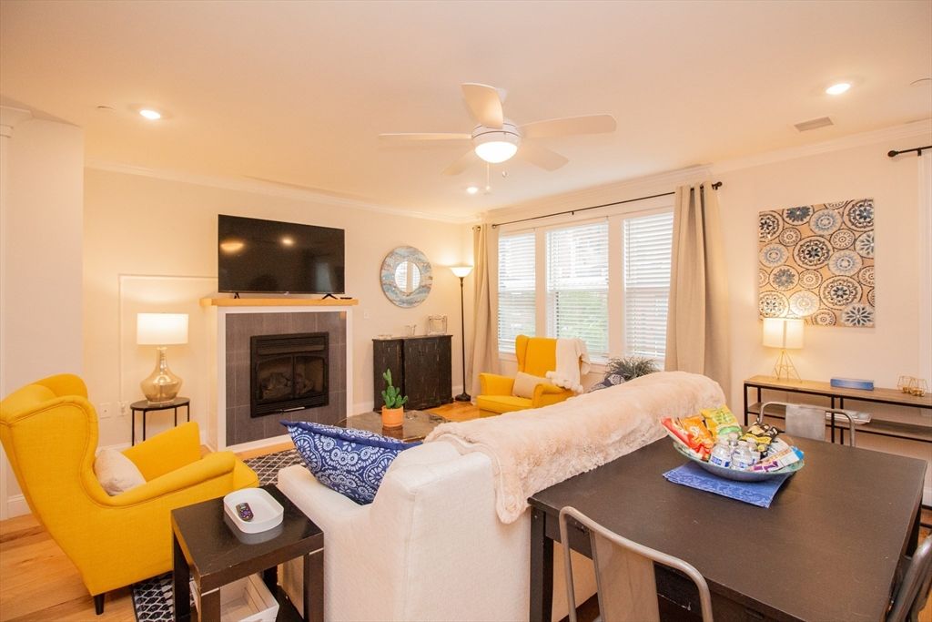 Dining room, Fireplace, Interior, Living room, Recessed Lighting, Wood Texture Flooring