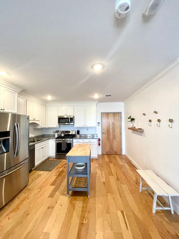 Interior, Kitchen, Recessed Lighting, Stainless Steel Appliances, Wood Texture Flooring