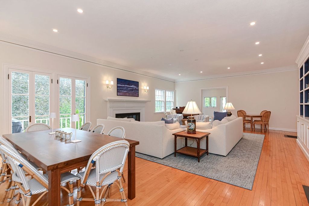 Dining room, Fireplace, Interior, Living room, Recessed Lighting, Wood Texture Flooring