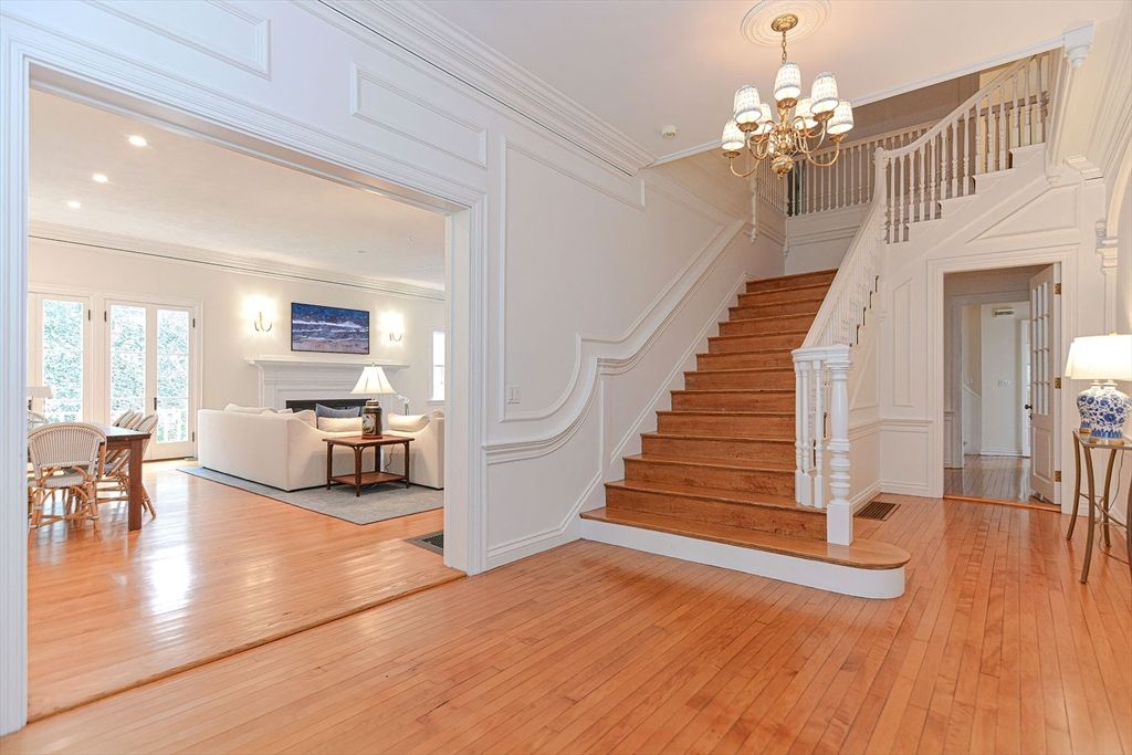Chandelier, Fireplace, Interior, Living room, Recessed Lighting, Wood Texture Flooring