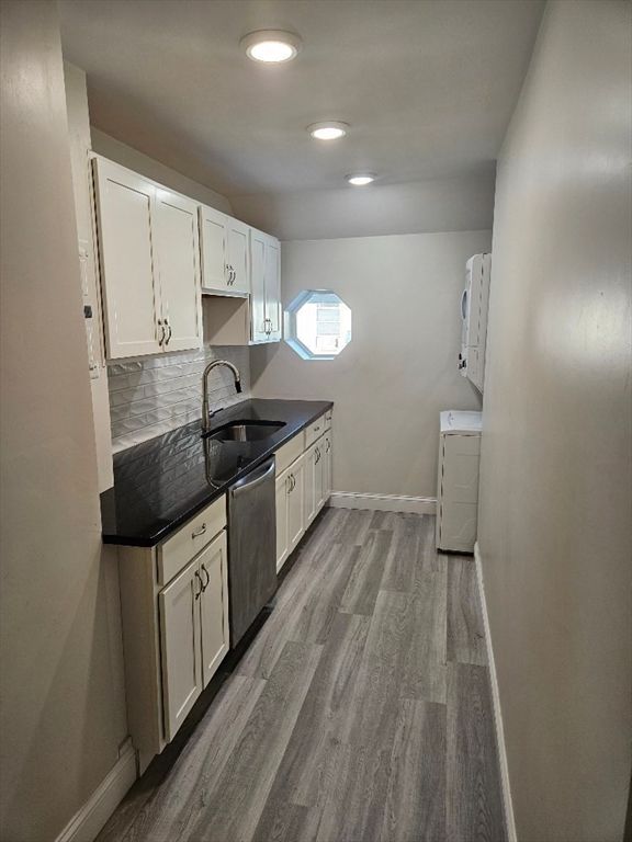 Interior, Kitchen, Recessed Lighting, Tile Countertops, Wood Texture Flooring