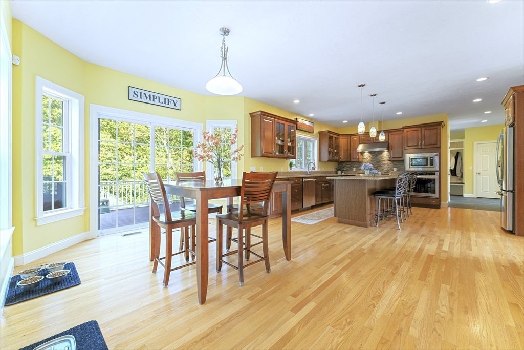 Dining room, Interior, Kitchen, Pendant Lights, Recessed Lighting, Stainless Steel Appliances, Wood Texture Flooring