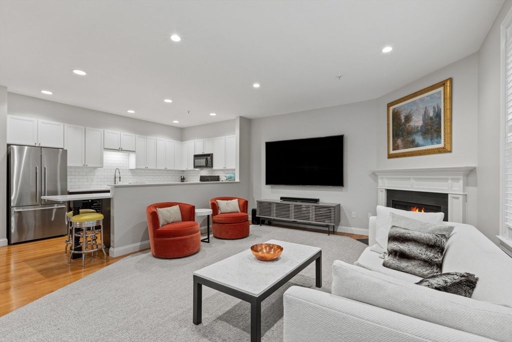 Fireplace, Interior, Kitchen, Living room, Recessed Lighting, Stainless Steel Appliances, Wood Texture Flooring