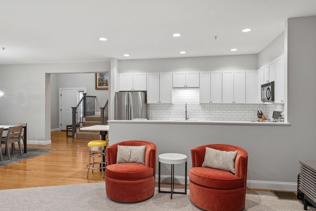 Dining room, Interior, Kitchen, Recessed Lighting, Stainless Steel Appliances, Wood Texture Flooring