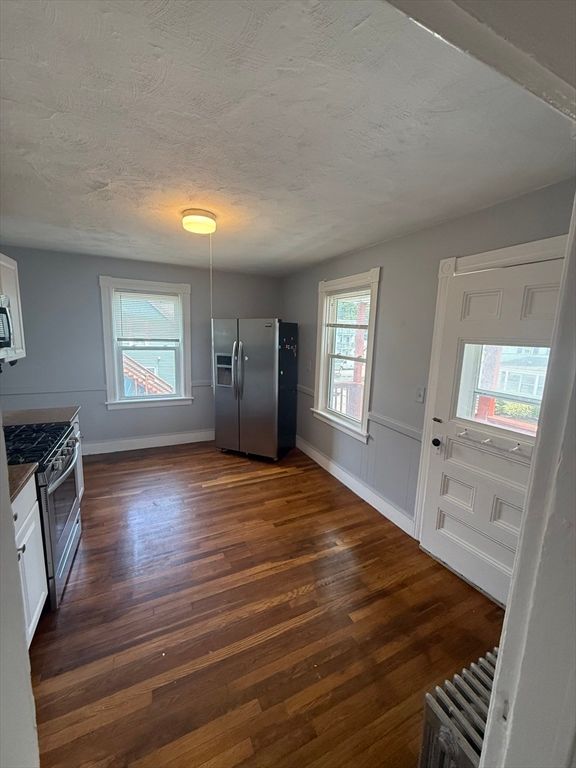 Empty room, Interior, Kitchen, Stainless Steel Appliances, Wood Texture Flooring