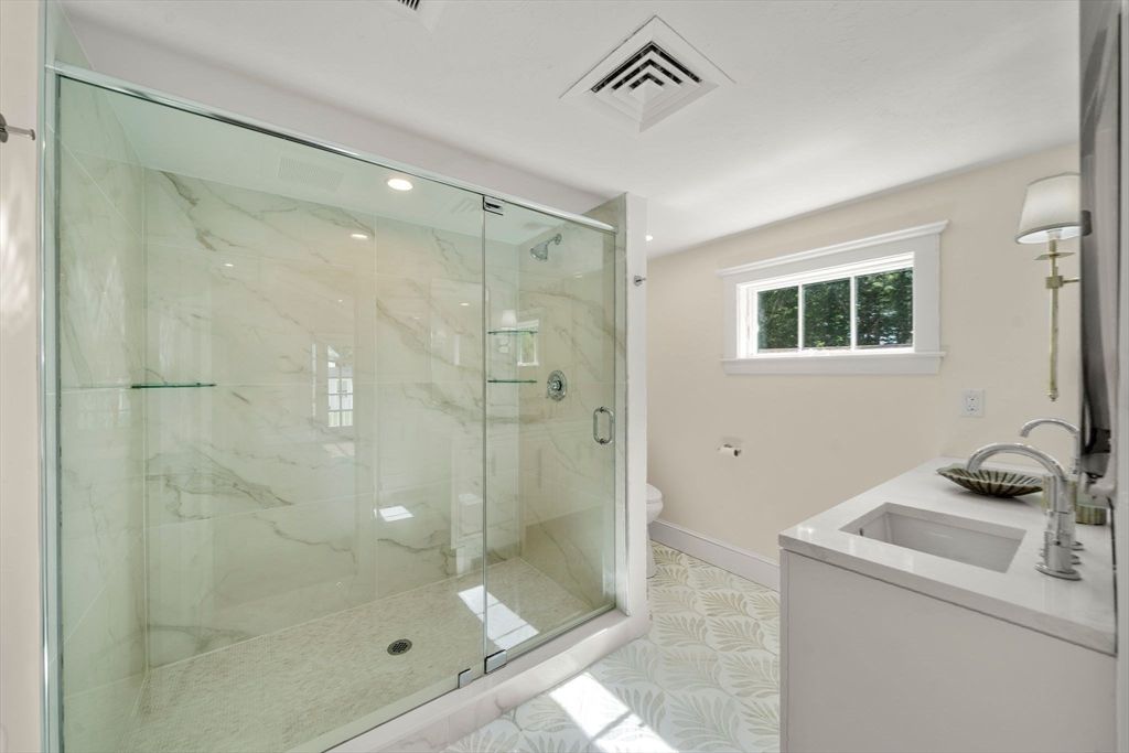 Bathroom, Dual Sink Vanities, Glass Shower, Interior, Marble Walls, Recessed Lighting