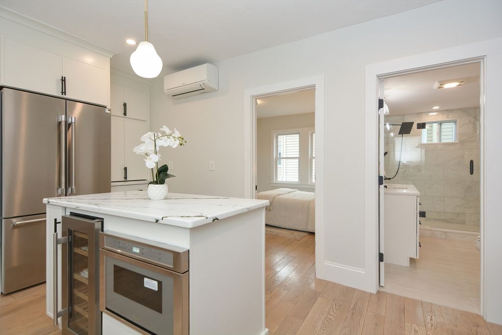 Bathroom, Interior, Kitchen, Marble Walls, Pendant Lights, Recessed Lighting, Stainless Steel Appliances, Wood Texture Flooring