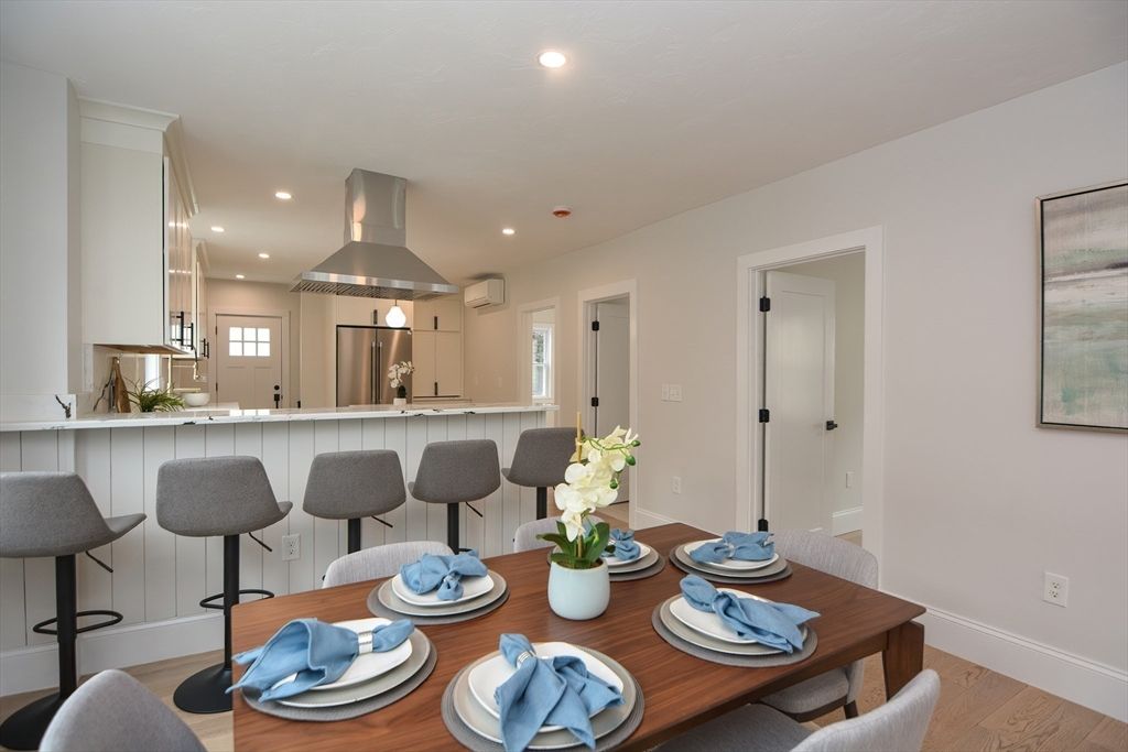 Dining room, Interior, Kitchen, Recessed Lighting, Stainless Steel Appliances, Wood Texture Flooring