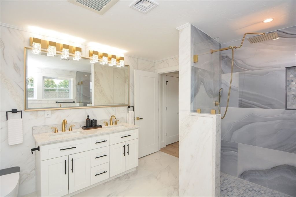 Bathroom, Dual Sink Vanities, Glass Shower, Interior, Marble, Marble Walls, Recessed Lighting