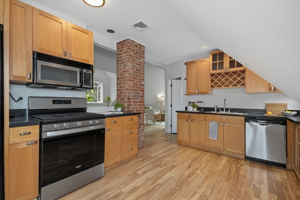 Interior, Kitchen, Recessed Lighting, Stainless Steel Appliances, Stone Walls, Wood Texture Flooring